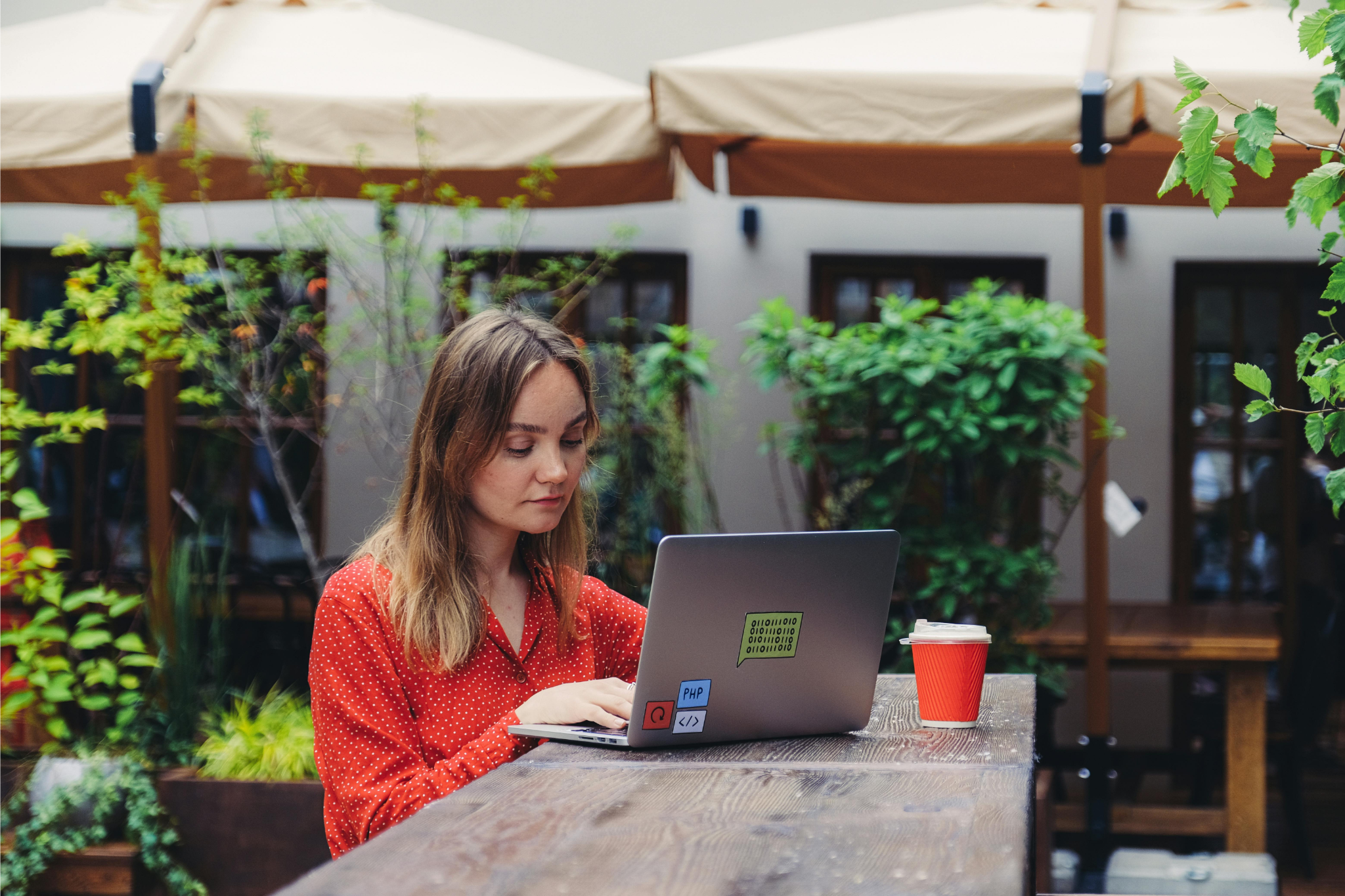 Remote worker focused in a cozy co-working space